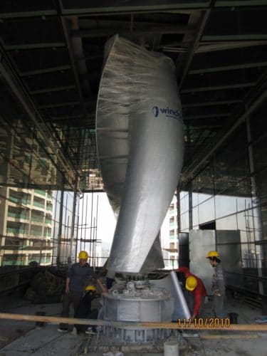 A vertical wind power turbine is being intergrated into the structures of a skyscraper. Picture from Windside Production